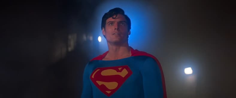 Superman (Christopher Reeve) delivers Lex Luthor (Gene Hackman) to the authorities in Superman: The Movie (1978), Warner Bros. Pictures