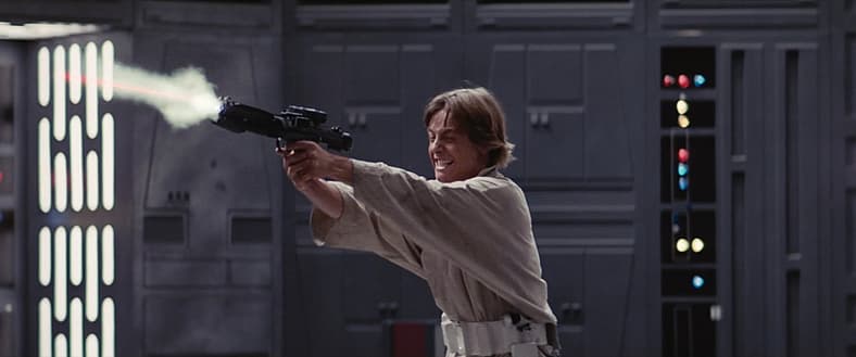Luke Skywalker blasts Stormtroopers in Star Wars Episode IV: A New Hope (1977), Lucasfilm