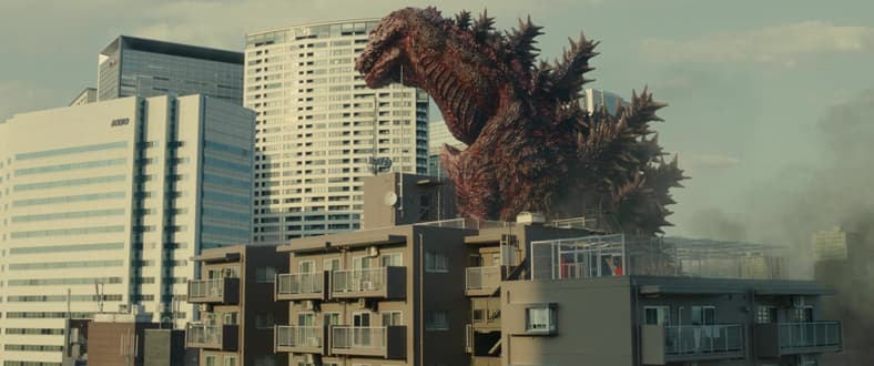 Gojira stands up to topple buildings in Shin Godzilla (2016), Toho Co. LTD