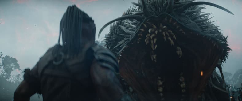 Dek (Dimitrius Schuster-Koloamatangi) faces a threat in Predator: Badlands (2025), 20th Century Studios