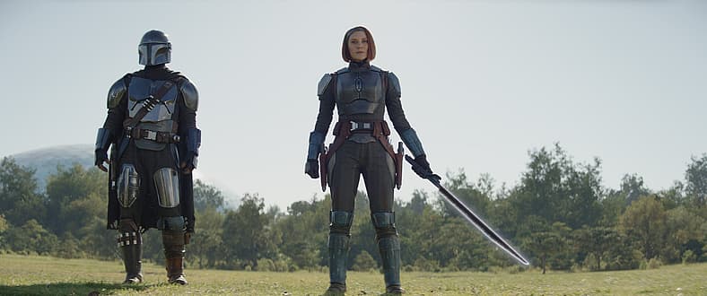 Din Djarin and Bo-Katan Kryze with the Darksaber in The Mandalorian season three