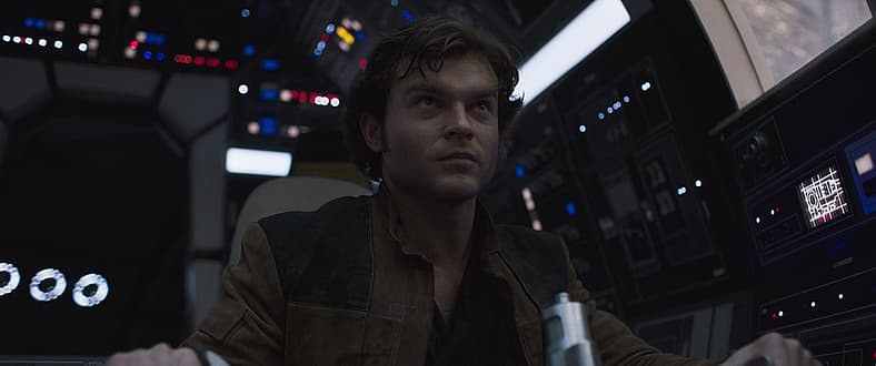 Han (Alden Ehrenreich) takes control of the Millennium Falcon in Solo: A Star Wars Story (2018)
