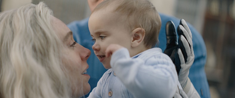 (L-R) Vanessa Kirby as Sue Storm/Invisible Woman and Ada Scott as Franklin Richards in 20th Century Studios/Marvel Studios' THE FANTASTIC FOUR: FIRST STEPS. Photo courtesy of Marvel Studios. © 2025 20th Century Studios / © and ™ 2025 MARVEL