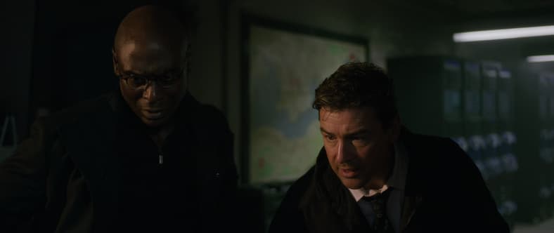 General Guillermin (Lance Reddick) and Dr. Mark Russell (Kyle Chandler) watch on as Mecha Godzilla unleashes its might in Godzilla vs Kong (2021), Warner Bros. Pictures