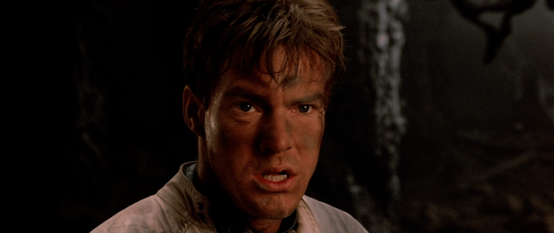 Willis Davidge locates the crash-landed enemy ship in Enemy Mine (1985), 20th Century Fox