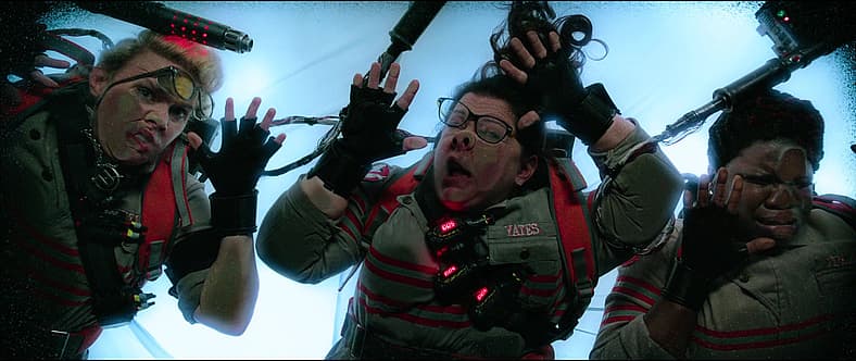 Erin Gilbert, Jillian Holtzmann, and Abby Yates land on Stay Puft Marshmallow Man in Ghostbusters