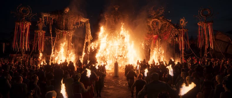 Festival goers celebrate as the wicker men burn, and a man burns alive, in Divinity (TBA), Larian Studios