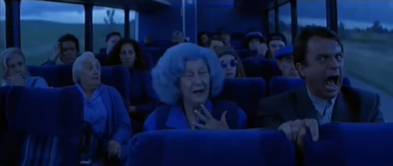 John Trent (Sam Neill) knows this isn't his bus in In The Mouth of Madness (1995), New Line Cinema