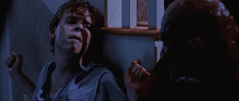 Freddy (Robert Englund) corners Jesse (Mark Patton) in A Nightmare On Elm Street 2: Freddy's Revenge (1986), New Line Cinema