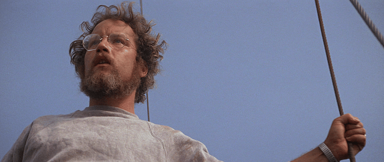 Matt Hooper (Richard Dreyfuss) sees the shark for the first time in Jaws (1975), Universal Pictures