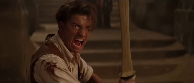 Airhead Rick (Brendan Fraser) acts tough in The Mummy (1999), Universal Pictures 