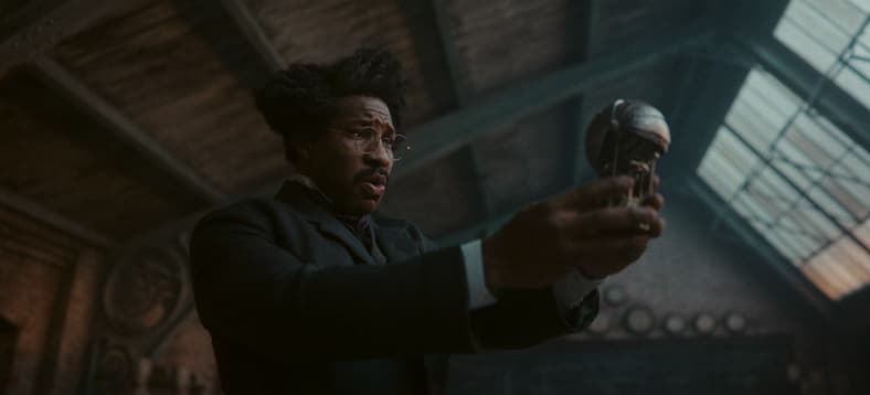 Victor Timely (Jonathan Majors) ponders his new device in Loki S2E3 "1893" (2023), Marvel