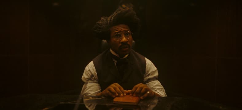 Victor Timely (Jonathan Majors) works on new TVA duties in Loki S2E4 "Heart of the TVA" (2023)