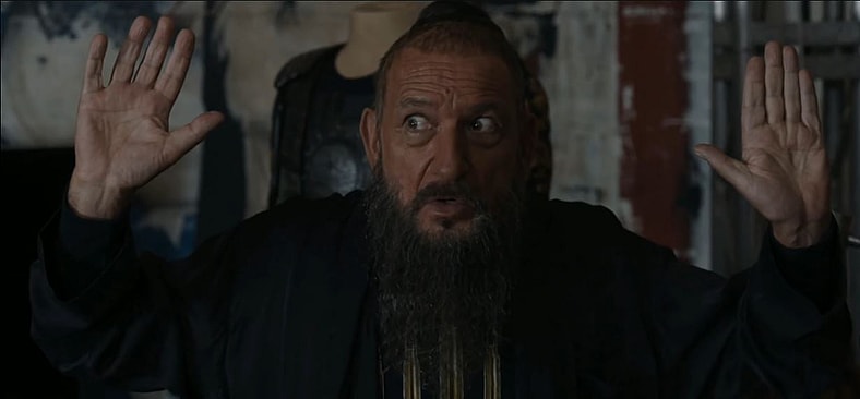 Trevor Slattery (Ben Kingsley) surrenders to Tony Stark (Robert Downey Jr.) after being outed as the Fake Mandarin in Iron Man 3, 2013, Marvel Entertainment