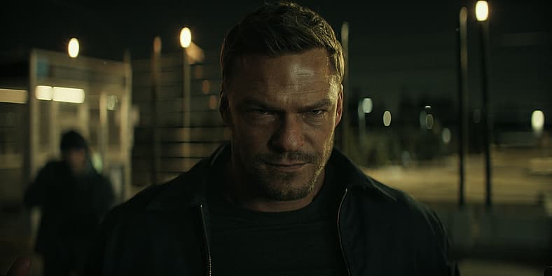 Jack (Alan Ritchson) smirks as his plan succeeds in Reacher Season 2 Episode 7 "The Man Goes
