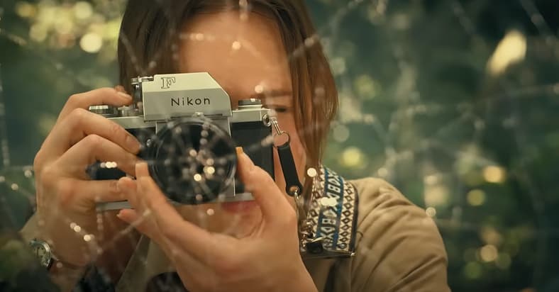 Constance (Kerry Bishé) researching spiders in Madame Web (2024), Sony Pictures Releasing
