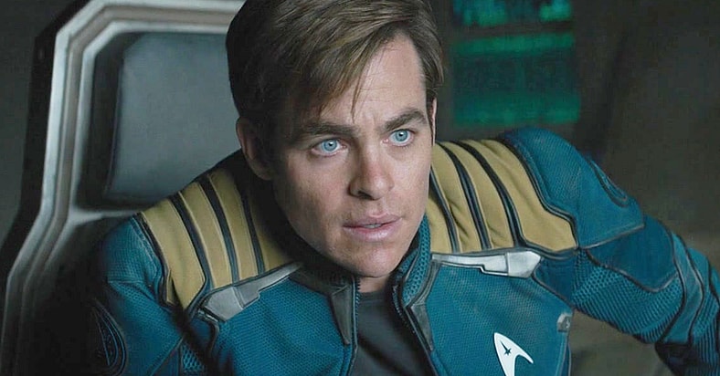 Captain Kirk (Chris Pine) takes a breather after crash landing the U.S.S. Enterprise in Star Trek Beyond (2016), Paramount Pictures