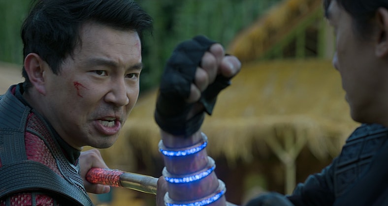 Shang-Chi (Simu Liu) clashes with Wenwu (Tony Leung) in defense of Tao Lo in Shang-Chi and the Legend of the Ten Rings (2021), Marvel Entertainment via Blu-ray