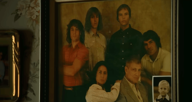 Von Erich family photo on the wall in The Iron Claw (2023), A24