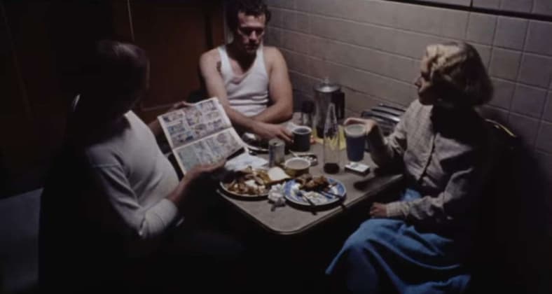Criminals (Tom Towles and Michael Rooker) share a moment of heavy silence with family (Tracey Arnold) in Henry: Portrait of a Serial Killer (1986), Greycat Films