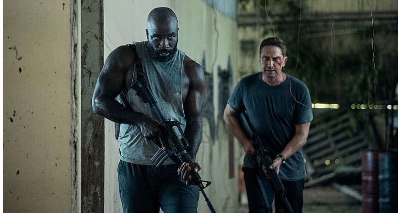 Mike Colter and Gerard Butler in Plane