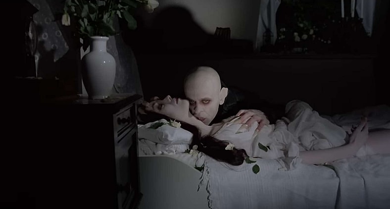 Count Dracula (Klaus Kinski) takes more more drink in Nosferatu the Vampyre (1979) 20th Century Fox