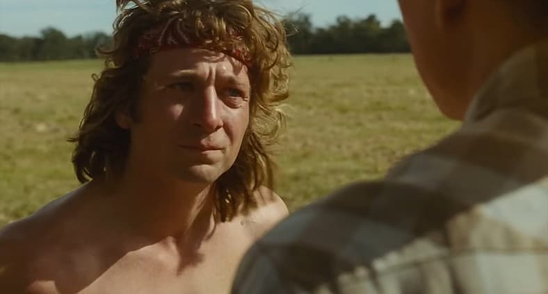 Kerry receives encouragement from his father Kevin in The Iron Claw (2023), A24