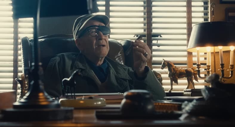 John Ford (David Lynch) enjoys a fine cigar in The Fabelmans (2022), Universal Pictures