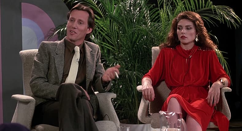 Max Renn and Nicki Brand debate degeneracy on a talk show in Videodrome (1983), Universal