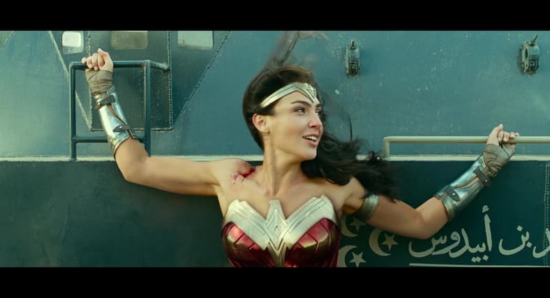 Diana positions herself between armored vehicles in Wonder Woman 1984 (2020), Warner Bros. Pictures