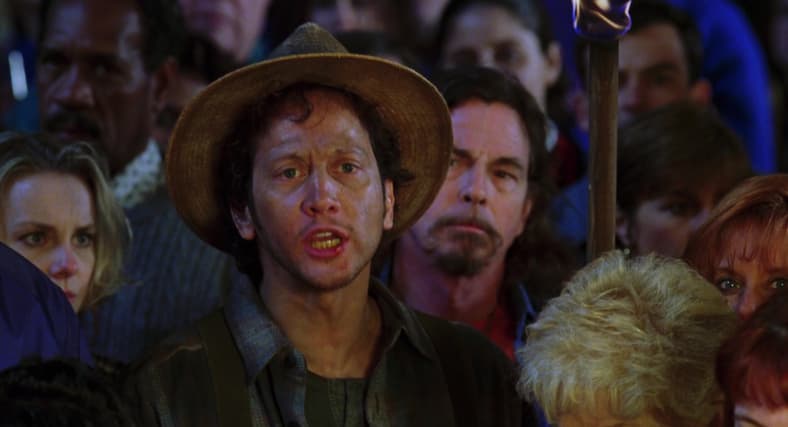 Rob Schneider encourages Bobby Boucher in The Water Boy (1998), Touchstone Pictures
