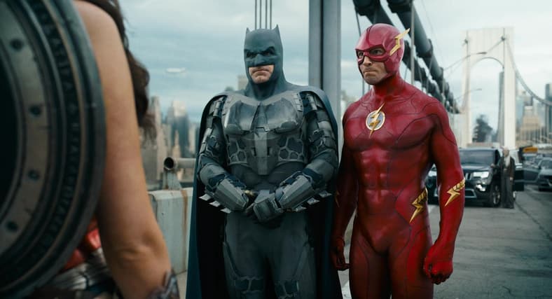Bruce and Barry are embarrassed after being exposed to Diana's Lasso of Truth in The Flash (2023)