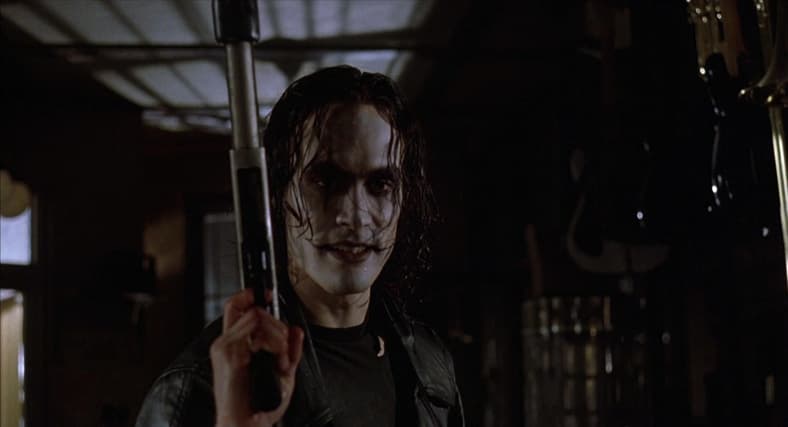 Eric Draven (Brandon Lee) wants Shelby's wedding ring back from Gideon (Jon Polito) in The Crow