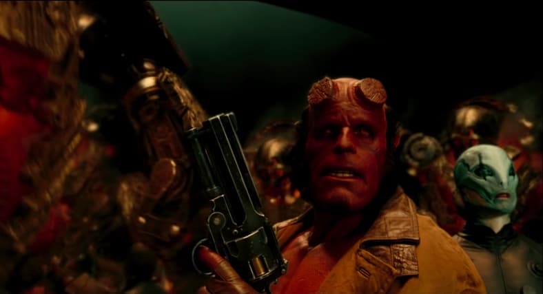 Hellboy (Ron Perlman) is locked and loaded in Hellboy II: The Golden Army (2008), Universal Pictures
