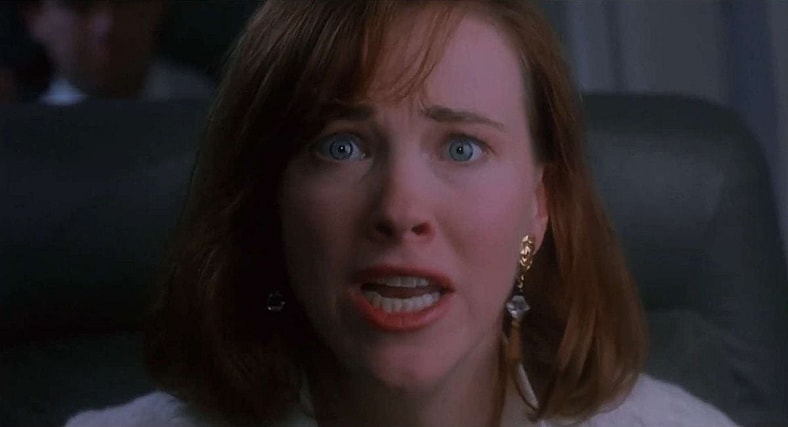 It finally dawns on Kate McCallister (O'Hara) that she's a terrible parent in Home Alone (1990), 20th Century Fox