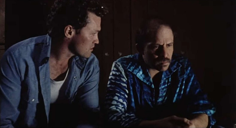 Otis (Tom Towles) considers following joining Henry's (Michael Rooker) murder crusade in Henry: Portrait of a Serial Killer (1986), Greycat Films   