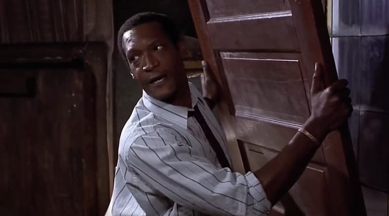 Tony Todd needs to hammer something out to keep the ghouls away in Night of the Living Dead (1990), Columbia Pictures
