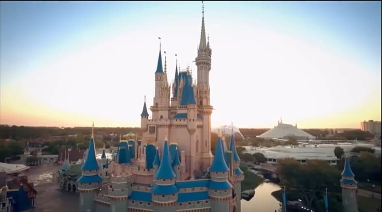 A wide shot os the Cinderella Castle at the Magic Kingdom park at the Walt Disney World Resort, via Sam's Disney Diary, YouTube