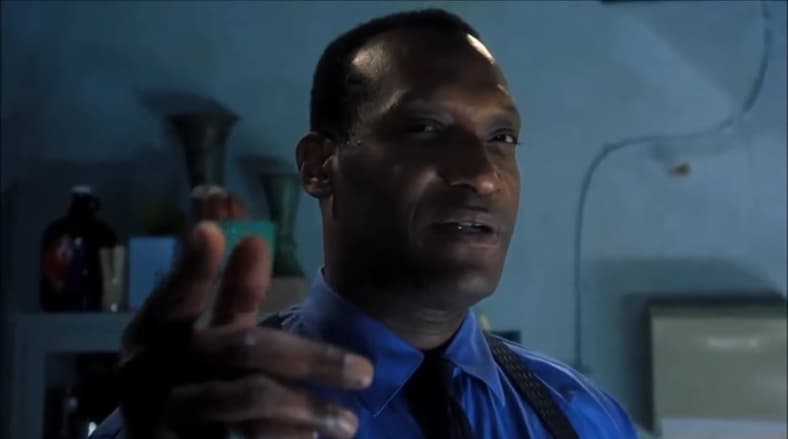 Mortician William Bludworth (Tony Todd) hopes to see Alex (Devon Sawa) again soon in Final Destination (2000), New Line Cinema