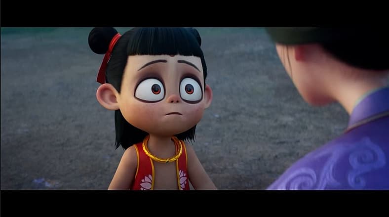 Ne Zha stares blankly at his mother in Ne Zha 2 (2025), voiced by Joseph Cao