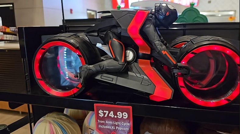 The Tron: Ares (2025) light cycle pocorn bucket on display at Cinemax Theaters