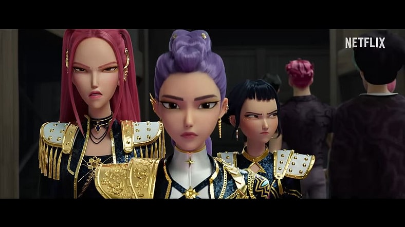 The Huntrix trio (Mira (Voiced by May Hong), Rumi (voiced by Arden Cho), and Zoey (voiced by Ji-young Yoo) walking off the stage in KPop Demon Hunters (2025), Sony Pictures Animation