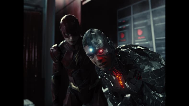 The Flash (Ezra Miller) checks in on Cyborg (Ray Fisher) after the latter experiences feedback from a Motherbox in Zack Snyder's Justice League (2021), Warner Bros. Pictures