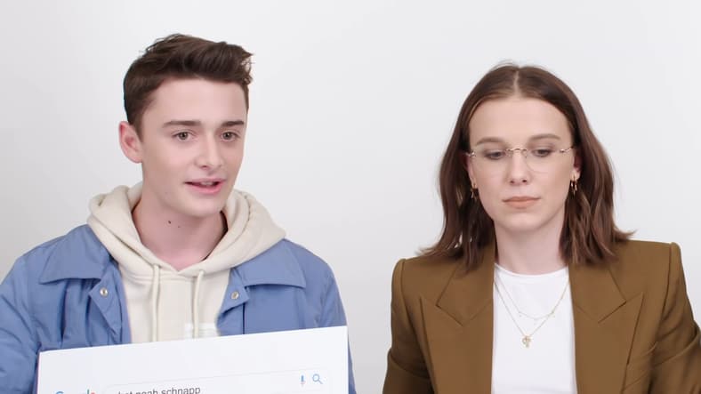 Millie Bobby Brown, Finn Wolfhard and Noah Schnapp answer web's most searched questions in WIRED