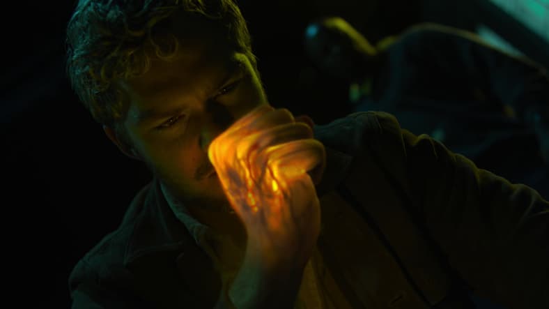 Danny Rand (Finn Jones) prepares to strike Luke Cage (Mike Colter) with Iron Fist in The Defenders