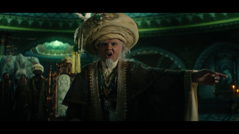King Bumi (Utkarsh Ambudkar) orders a feast for guests in Avatar: The Last Airbender S1E4 "Into the