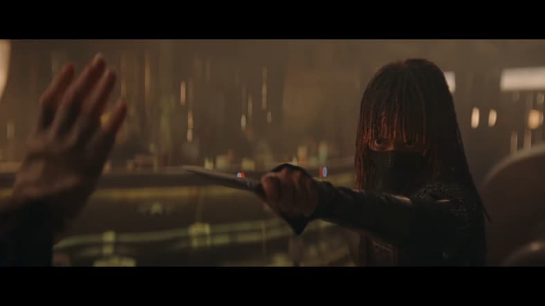 A Sith (Amandla Stenberg) finds herself on the losing end of a fight with Master Indara (Carrie-Anne Moss) in The Acolyte (2024), Disney