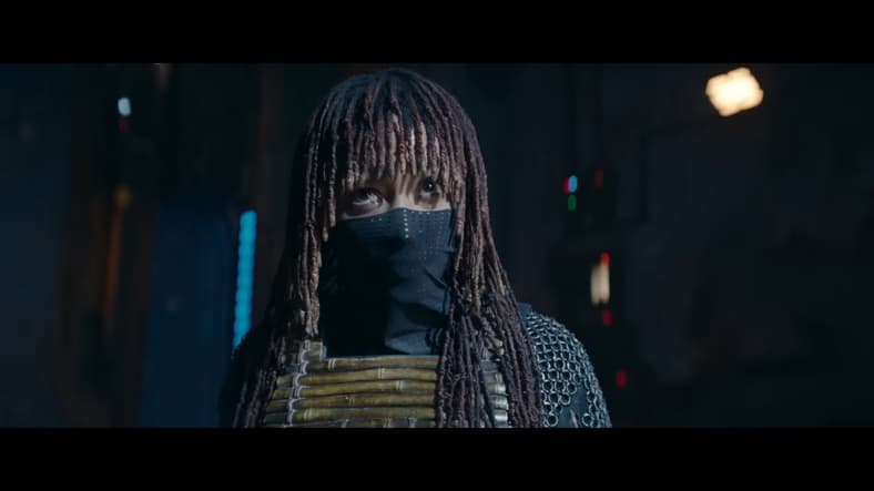 Mae (Amandla Stenberg) finds herself in the headlights of a passing airship in The Acolyte (2024), Disney
