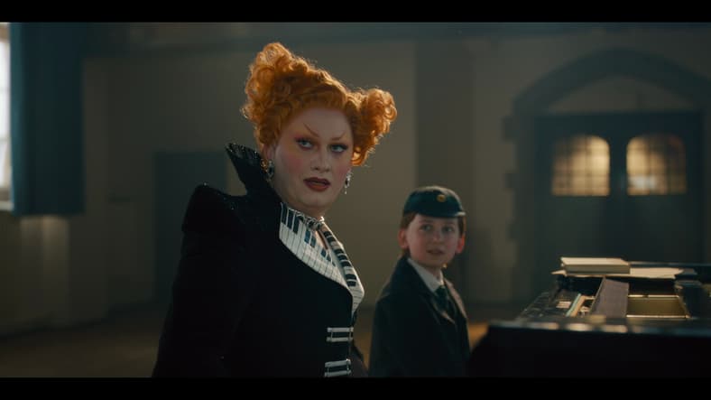 The Maestro (Jinkx Monsoon) appears before their son Henry (Kit Rakusen) in Doctor Who Series 14