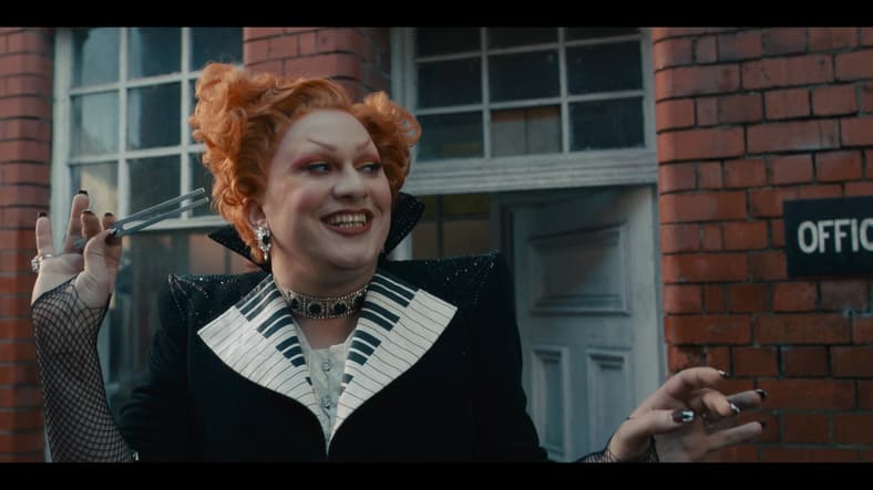The Maestro (Jinkx Monsoon) pursues The Doctor (Ncuti Gatwa) in Doctor Who Series 14 Episode 2 "The